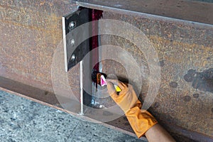 Step to use brush apply Liquid Penetrant into the welded with process Penetrant TestingPT photo
