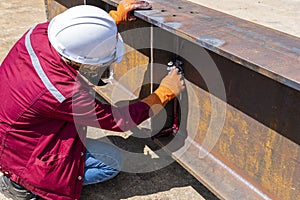 Step to use rag wipe Liquid Penetrant out to welded surface before Developer spray into the welded for Non-Destructive Testing