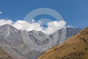 Stepantsminda - Amazing view on ridges in the Greater Caucasus Mountains in Georgia.