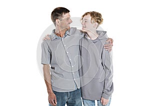 stepfather and teen son standing isolated on white background