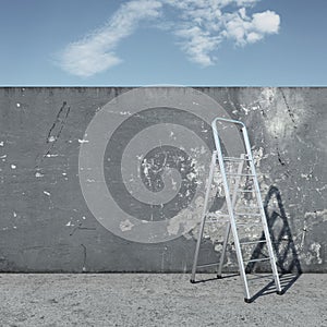 Stepladder with wall in front of sky