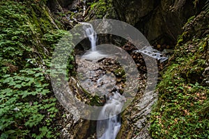 steps in a clear cold waterfall