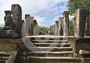 On the steps of the Council chamber of the Royal Palace. Polonnaruwa, Sri Lanka