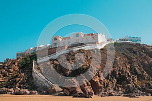 Steps leading to Aftas Beach in the chill coastal town of Mirleft, Morocco. Landmark popular with surfers, locals, and tourists. photo