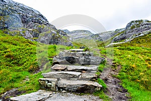 Steps made of stones on the way to famous Kjeragbolten. Norway