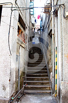 Steps through old narrow alley photo