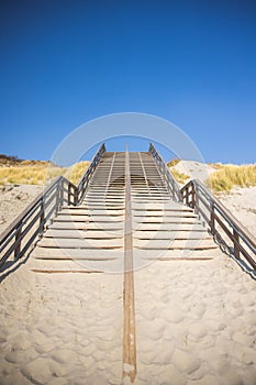 Steps over sand dunes on beach
