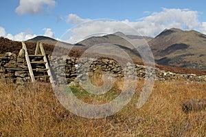 Steps over stone wall.