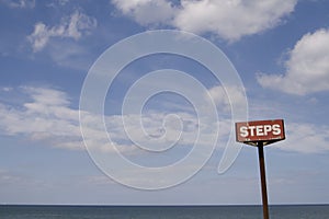 Steps sign on Sea front