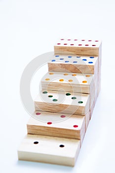 steps or stair of wooden domino on white