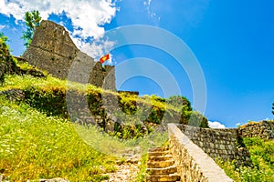 Steps to Kotor fortress and Montenegro flag atop