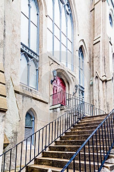 Steps Up to Red Door in Church