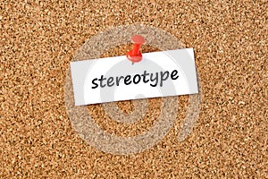 Stereotype. Word written on a piece of paper, cork board background