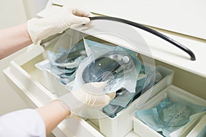 Sterile storage of medical and surgical instruments in the dentist`s office. View from above. Closeup shoot.