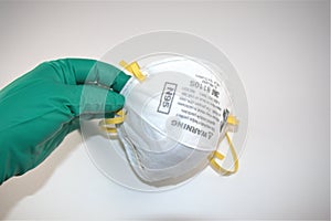 Sterile surgical gloves and N95 Respirator and surgical mask