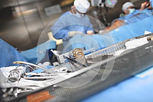 Sterile surgical tools in the dish on the background of working