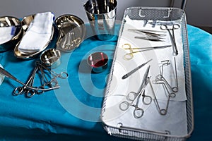 Sterilised surgical tools and equipment in trays in hospital operating theatre