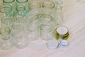 Sterilized empty glass jars prepared for food conservation process.