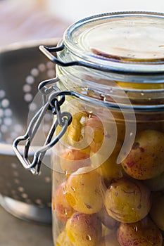 Sterilized mirabelle plums, homemade fruits in syrup for the winter, preserves nutrients