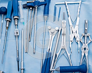 Sterilized surgical instruments and tools on the blue table