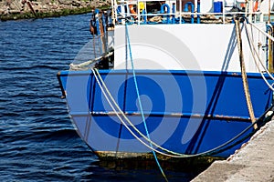 Stern of Blue Painted Fishing Boat at a Harbour Location