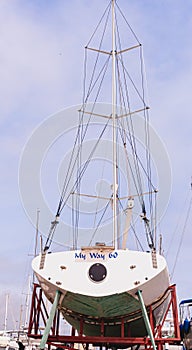 Stern of large, sea going, sail vessel, out of water, for reconditioning photo