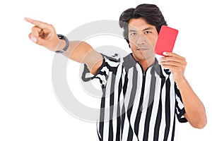 Stern referee showing red card