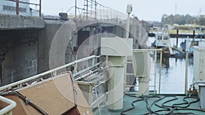 Stern of the ship, smoke coming from a diesel