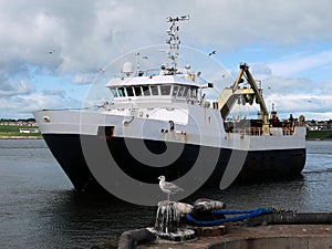 Stern Trawler Arriving at Harbour.