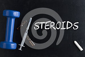 Steroids Written on a Chalkboard photo