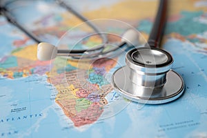 Stethoscope on Africa world globe map background