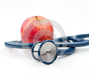 Stethoscope and an apple