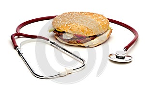 Stethoscope around a hamburger