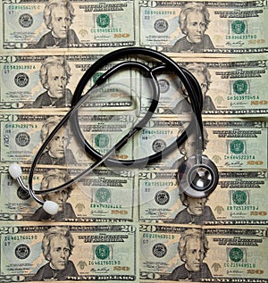 Stethoscope on a background of $20 bills