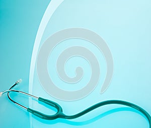 Stethoscope on blue background