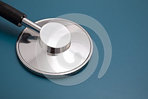 Stethoscope on blue background photo