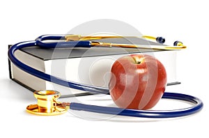 Stethoscope, book and apple