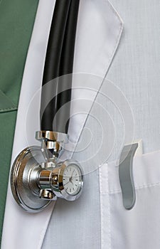 Stethoscope with clock on doctor's smock photo