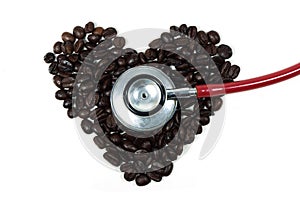 Stethoscope on a coffee beans in shape of heart