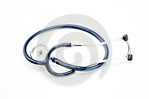 Stethoscope coiled on bright white surface