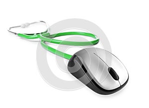 Stethoscope with computer mouse on white background