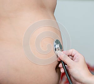 Stethoscope concept of fat children with belly