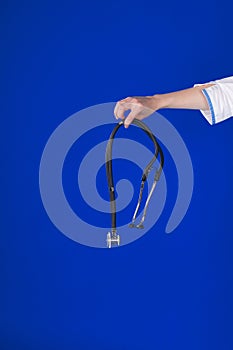 Stethoscope in doctors hand