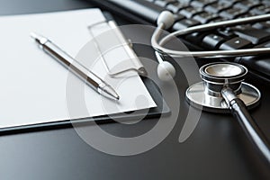 Stethoscope, Document Board, Keyboard computer, Notebook, Pen  on black background and copy space