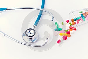 Stethoscope and drug pill for doctor and medical nursing people check up healing of patients