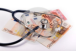 Stethoscope on euro money - healthcare cost concept