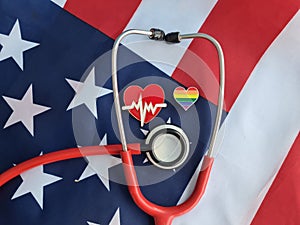 Stethoscope and flag of America on a rainbow background symbol of LGBT pride month