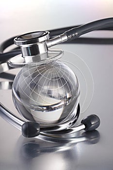 Stethoscope on globe