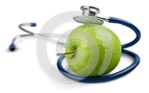 A Stethoscope and a Green Apple