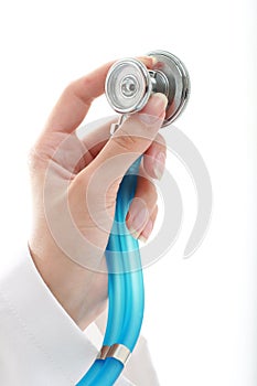 Stethoscope in hand.